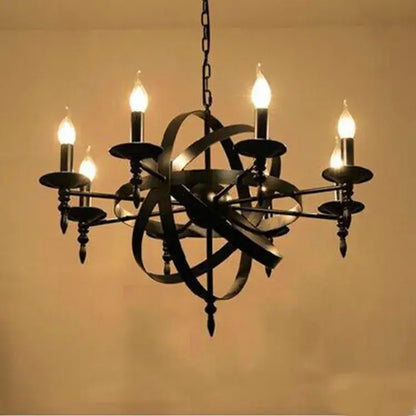 Black decorbites iron chandelier with five lit candle-style bulbs and intricate spherical design for dining room lighting