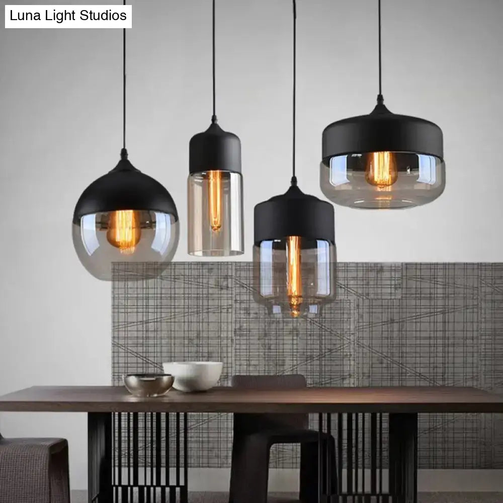 Set of three decorbites™ light pendant lighting with black metal tops and smoked glass shades in retro industrial style