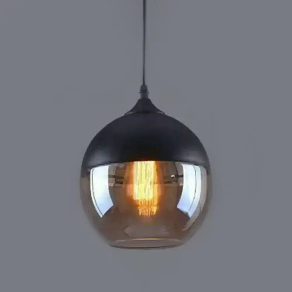 DecorBites 1 light pendant lighting with a spherical glass globe and metallic top in retro industrial style for restaurants