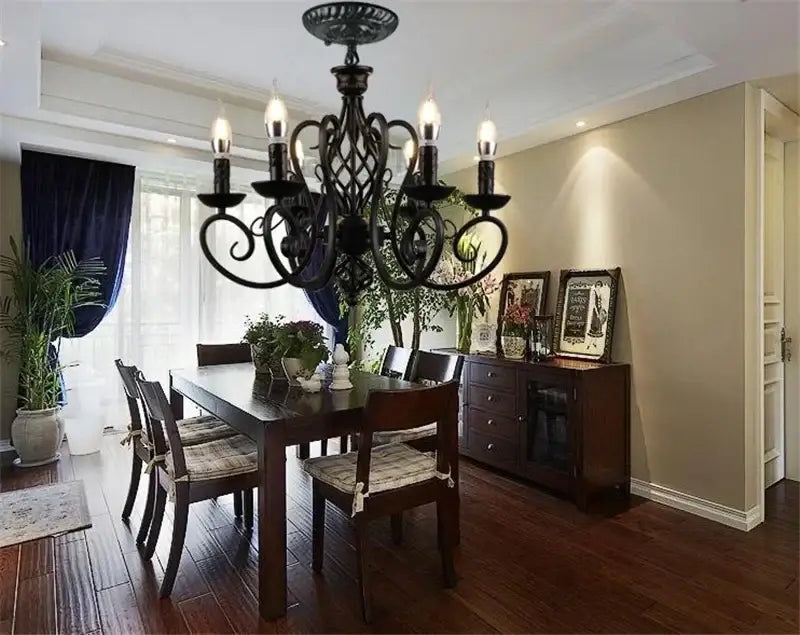 Retro industrial black wrought iron chandelier with ornate scrollwork and candle-style bulbs for living room decorbites black wrought