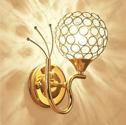 Retro industrial gold wall lamp sconce with spherical crystal globe design for elegant bedroom lighting