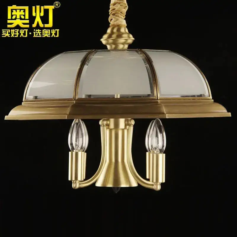 Gold-toned brass retro iron bronze pendant light with domed glass shade and two exposed filament bulbs for living room decorbites iron bronze pendant