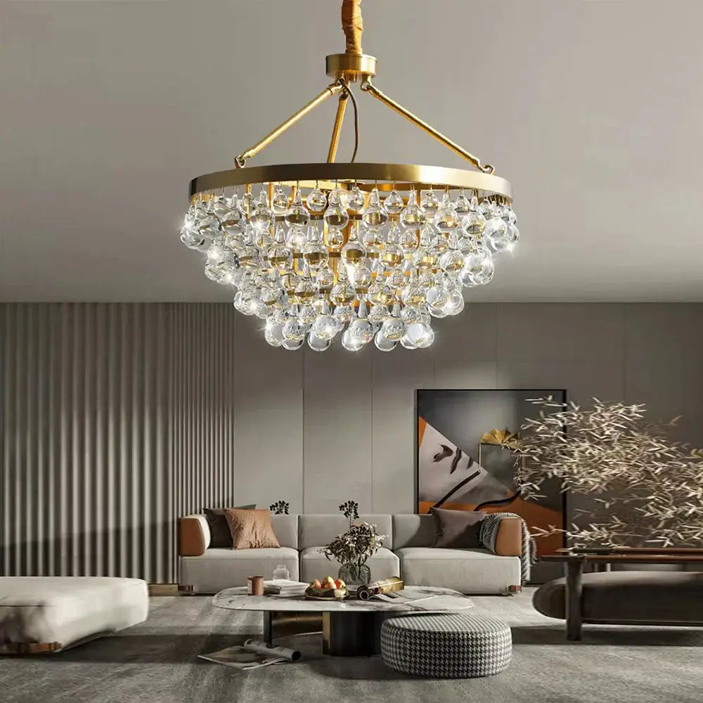 A luxurious retro gold pendant light with clear decorbites crystal bead droplets for elegant dining room decor
