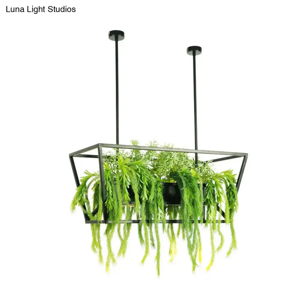Black metal hanging planter with geometric frame and cascading foliage paired with decorbites™ retro metal ceiling light