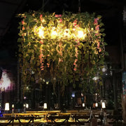 Decorbites™ retro metal ceiling light with 4 LED heads and plant decor featuring green vines and pink flowers