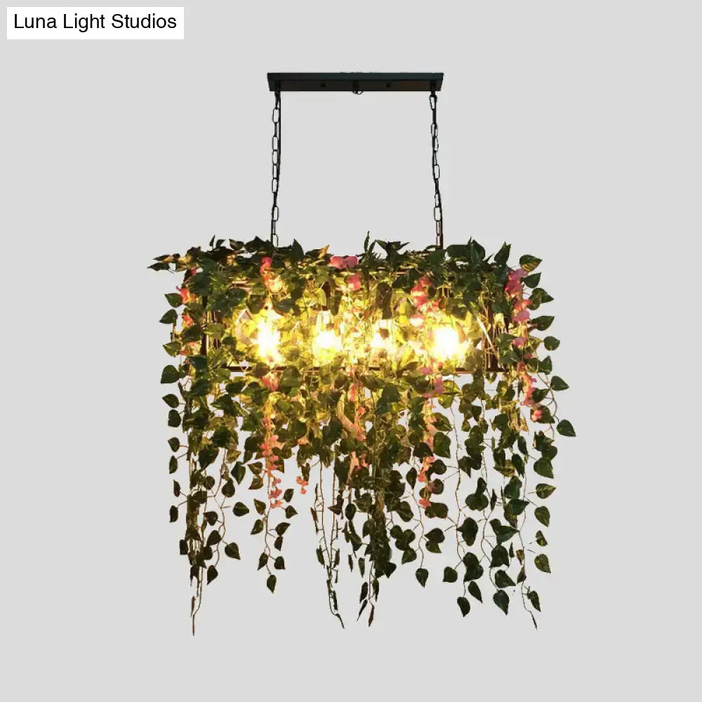 DecorBites™ retro metal ceiling light with black frame, hanging chains, and lush green plant decor for restaurants
