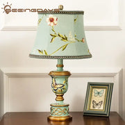 Retro mint green resin table lamp with gold accents and hand-painted butterflies for elegant bedroom decorbites green resin decor