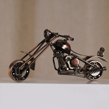 Detailed metal figurine of a retro motorcycle model in matte black and copper finish for living room decor
