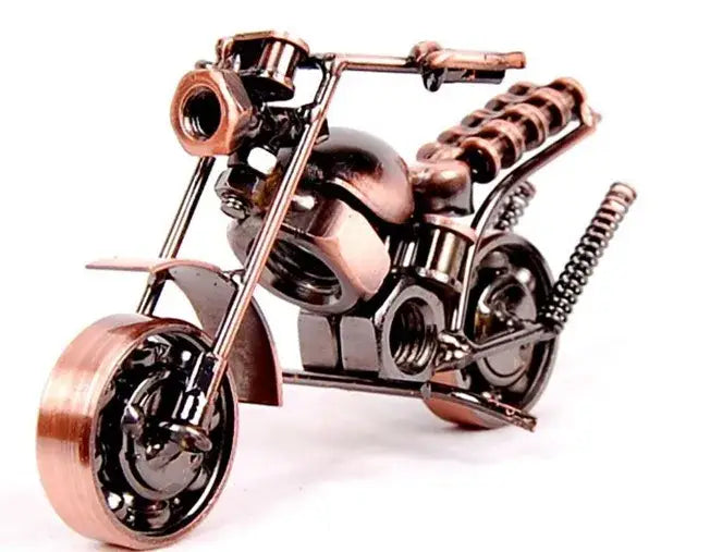 Copper-toned metal figurine of a retro motorcycle model chopper crafted from nuts bolts and springs for living room decor
