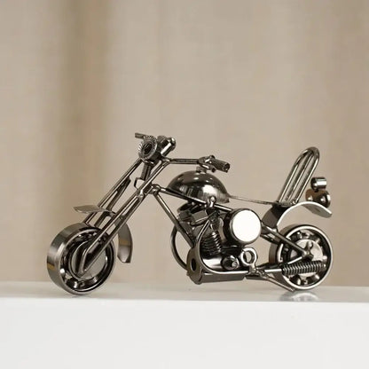 Shiny metallic chopper retro motorcycle model metal figurine crafted from repurposed parts for living room decor