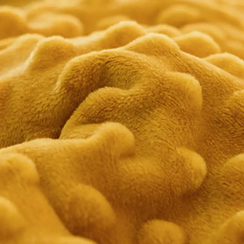 Golden-yellow cotton floral double quilt featuring a soft plush textured surface with raised rounded tufts