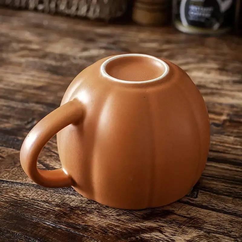 Retro orange halloween pumpkin ceramic mug with terracotta color matte finish and retro enamel handle for kitchen use