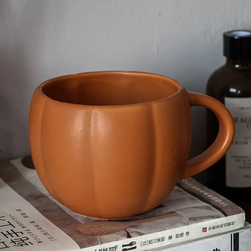 Matte orange halloween pumpkin ceramic mug with vertical ridges and retro enamel handle for kitchen use