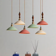 Retro pastel ceramic and brass chandelier light with wooden finials as decorbites brass chandelier for dining rooms