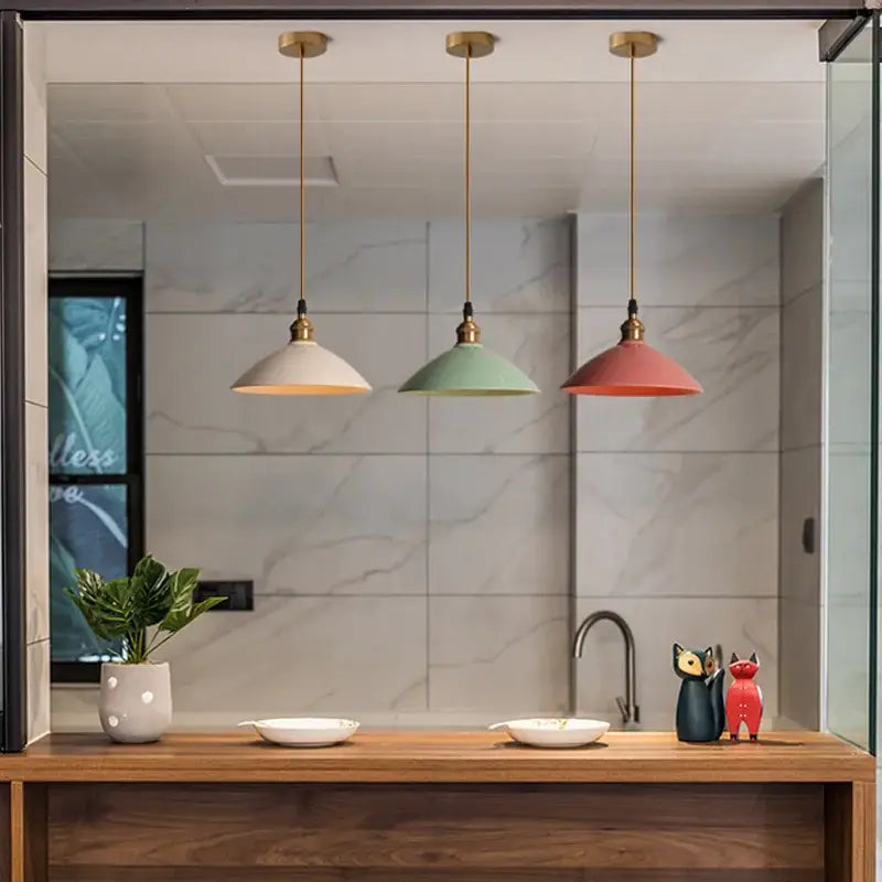 Three pendant brass chandelier light with retro pastel ceramic shades in cream mint green and coral pink by decorbites