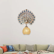 Silver peacock wall lamp with blue gemstone eyes, clear crystal details, golden mosaic shade, and peacock backplate for living room