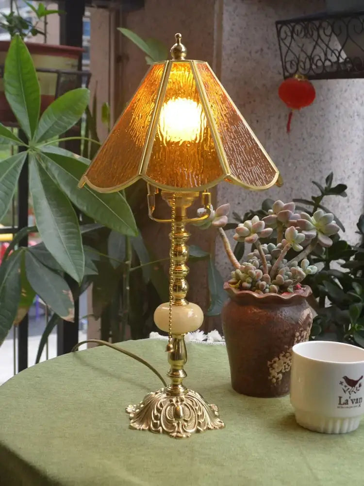 Retro pink stained glass brass desk lamp with golden brass base and textured amber shade for vintage decorbites brass desk lamp