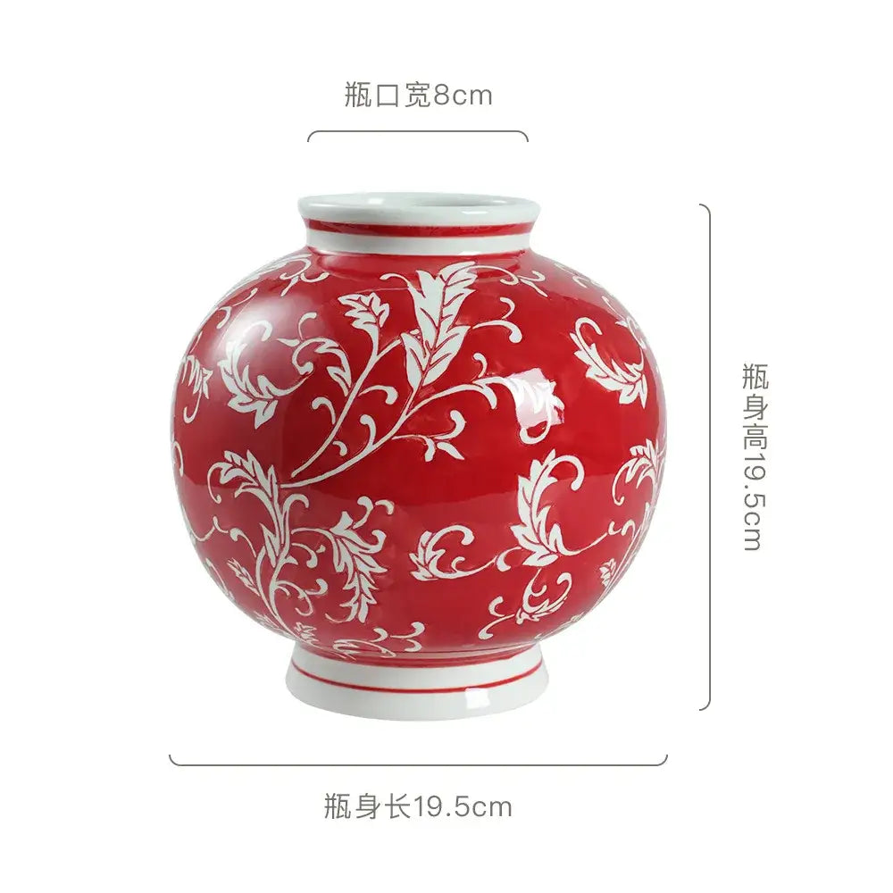 Glossy red ceramic vase with intricate white floral patterns and white rim for living room decorbites blue white porcelain decor