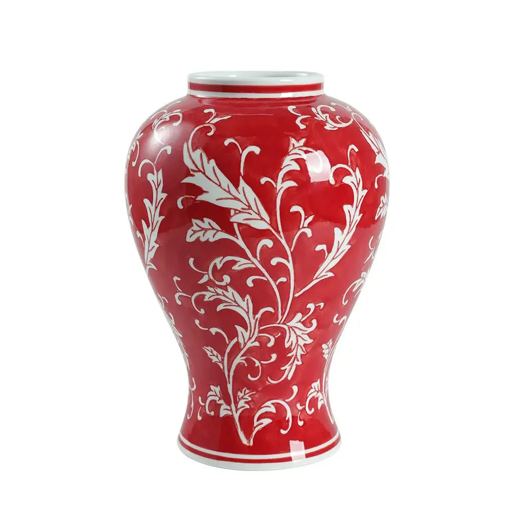 A glossy red ceramic vase with intricate white floral vine patterns for retro pink and white porcelain vase living room decor