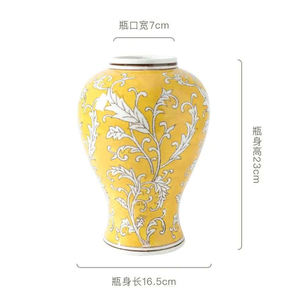 A vibrant yellow ceramic vase with intricate white floral patterns and a glossy finish for living room decorbites blue white porcelain use
