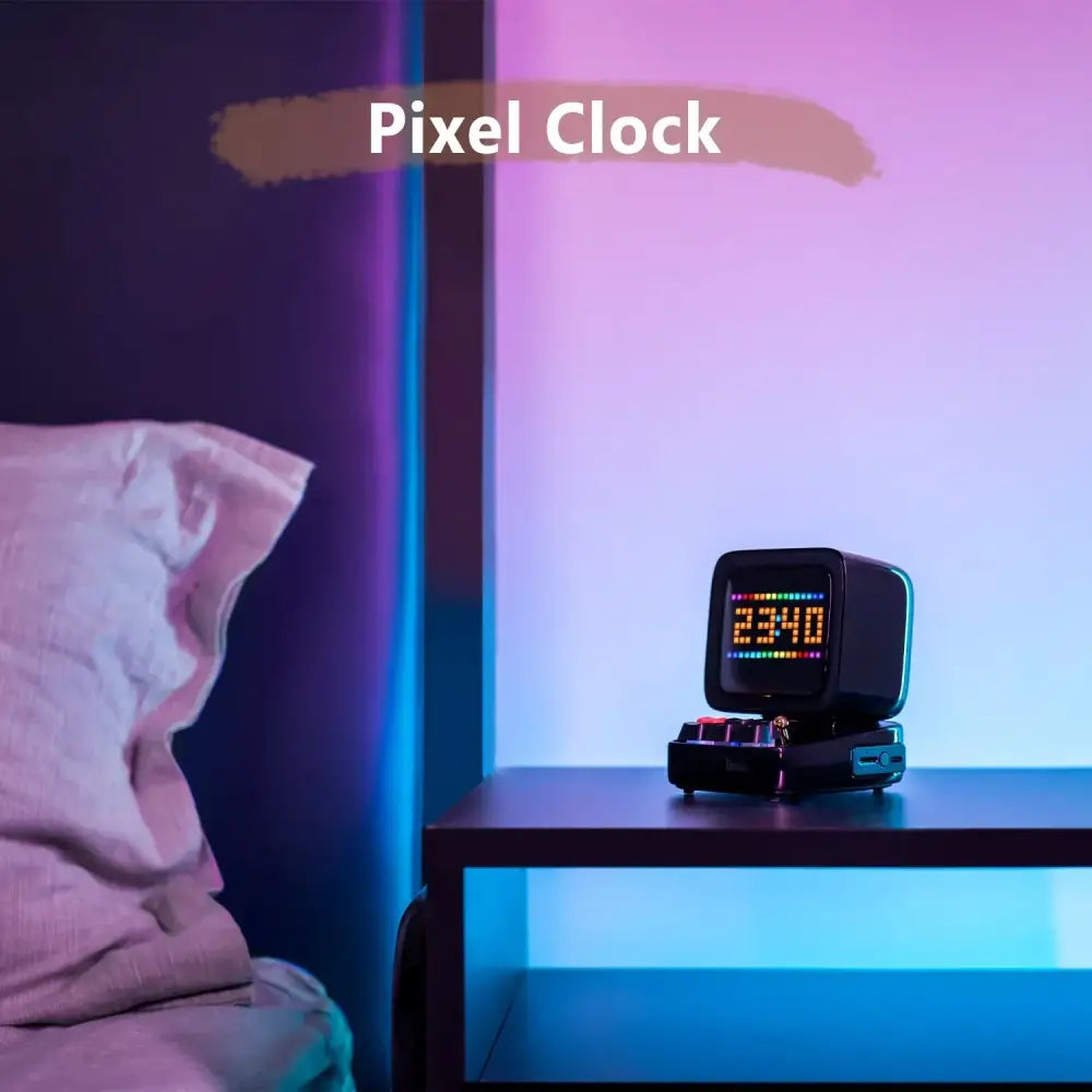 Black retro pixel art bluetooth speaker with led display board showing 23:40 and small buttons on base