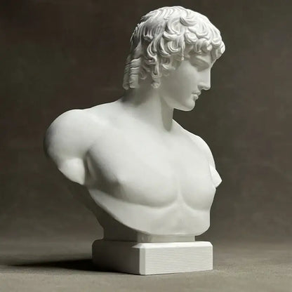 White marble retro plaster sculpture bust of antinous with curly hair and defined musculature decorbites antinous retro