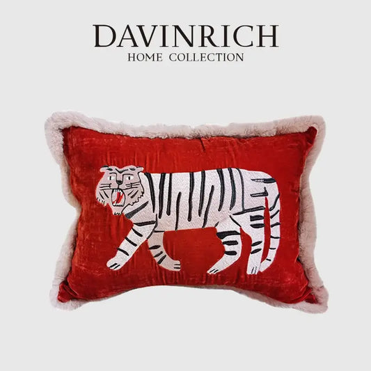 Red velvet cushion cover with black striped white tiger embroidery and beige fluffy trim from davinrich home decorbites furry tiger collection