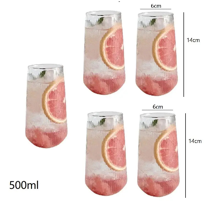 Retro ribbed glass coffee cup set with pink gradient textured tumblers featuring grapefruit slices and stirrers