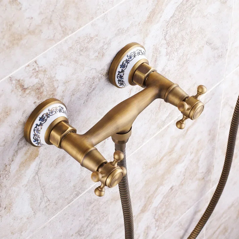 Antique brass finished double-handle shower faucet with blue and white porcelain accents for bathroom wall mount