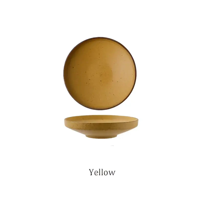 Yellow ceramic round plate with speckled texture and raised rim from decorbites ceramic round plate set