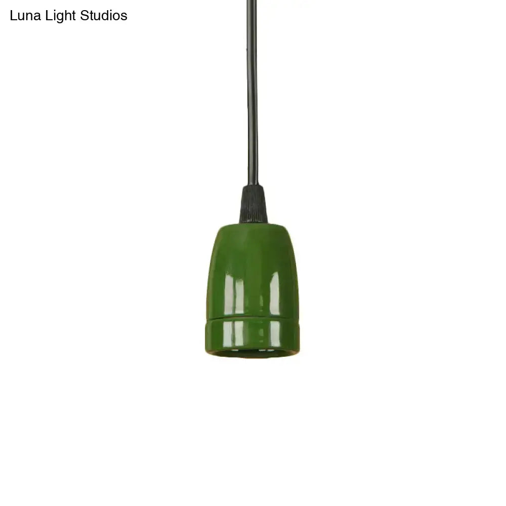 Decorbites™ retro style mini pendant light in glossy olive green ceramic with adjustable black cord and red ceramic ceiling fixture