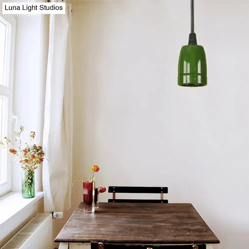 DecorBites™ retro style mini pendant light with adjustable cord featuring a sleek green glass shade and black red ceramic fixture