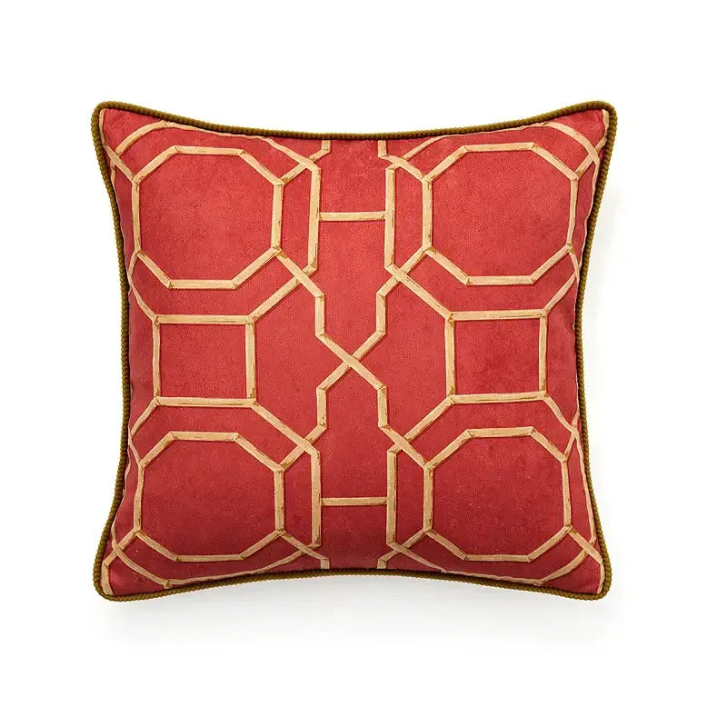 Red velvet throw pillow with gold geometric embroidery and corded border complements decorbites american luxe cushion covers