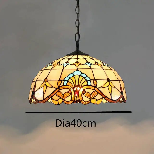 Retro tiffany style colorful glass chandelier with amber floral and shell patterns in a black metal frame by Decorbites colorful glass