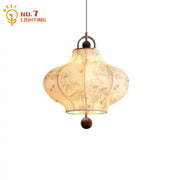 Cream fabric retro pendant lights with intricate floral embroidery and dark wooden finial by decorbites wabi-sabi for bedroom decor