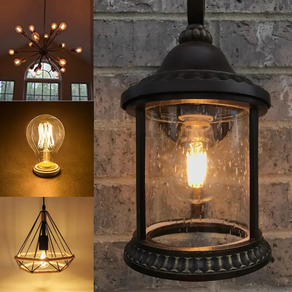Black wrought iron lantern with textured glass enclosing retro warm white edison led bulbs for living room lighting