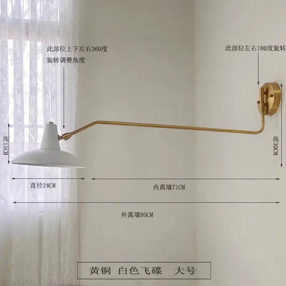 A sleek brass wall lamp with white conical shade and adjustable swing arm for bedroom reading decorbites copper swing