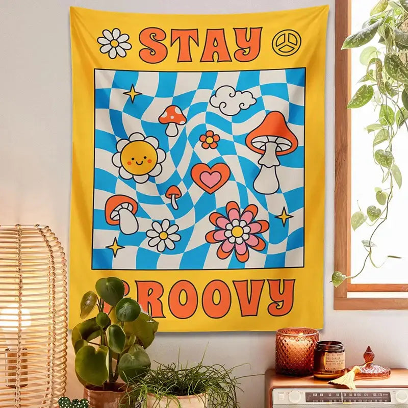A vibrant yellow and blue decorbites groovy mushroom tapestry featuring psychedelic mushrooms and daisy motifs for wall decor