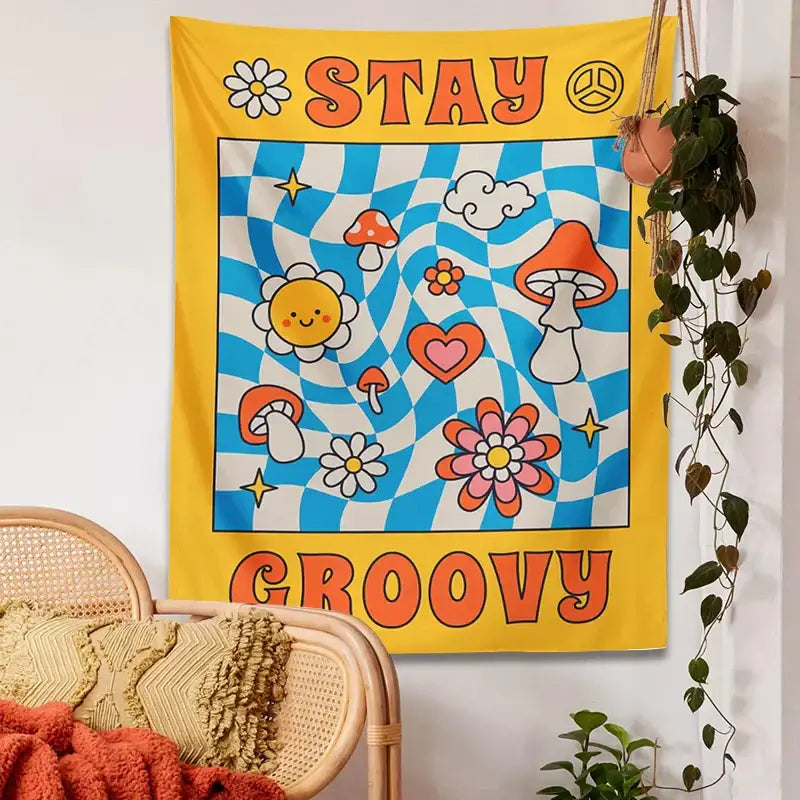 A vibrant yellow and blue groovy mushroom tapestry by decorbites featuring psychedelic mushrooms and flowers for wall decor