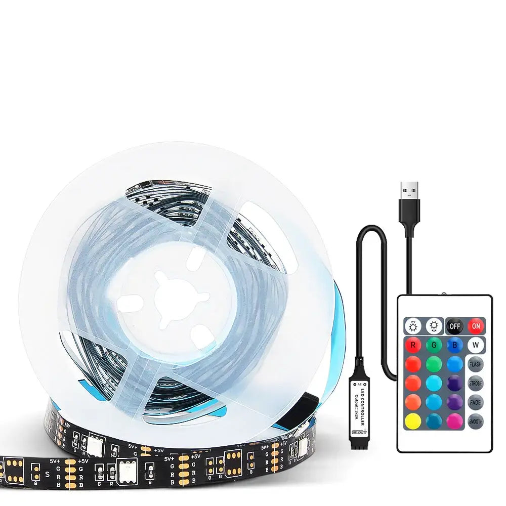 Rgb bluetooth led strip lights with black circuit board and blue backlighting on clear spool with remote control