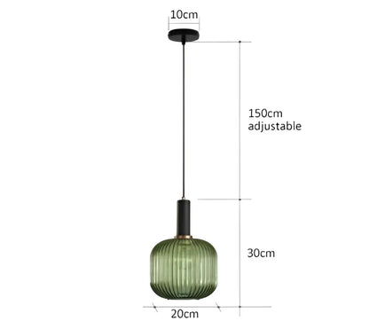 Green ribbed glass pendant light with black metal hardware from decorbites colorful glass pendant collection for dining room lighting
