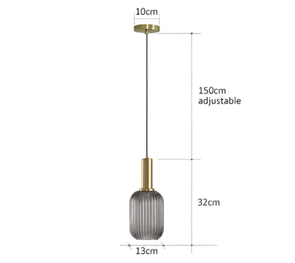 Modern pendant lights with gold-toned metal fixture and ribbed smoked glass shade for dining room decorbites colorful glass