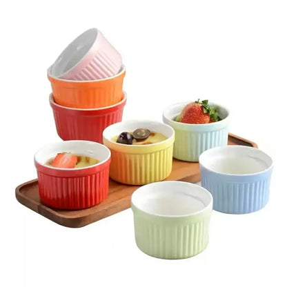 Set of colorful ribbed decorbites ceramic baking bowls in pastel and vibrant hues for individual dessert serving