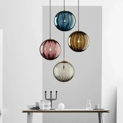 Set of four ribbed colorful glass ball pendant lights in blue rose gold amber and frosted clear for living room decorbites pendant lamp