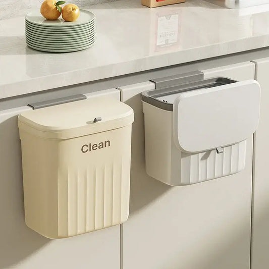 Cream-colored ribbed plastic kitchen cabinet hanging trash cans with gray metal hinges and lids by decorbites kitchen
