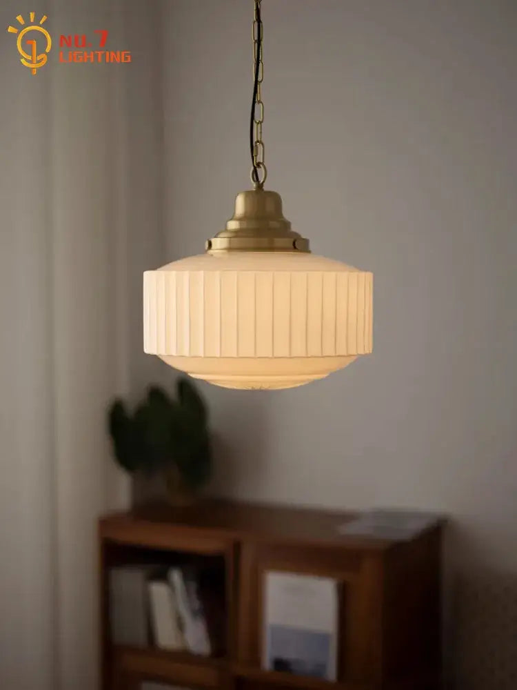 Ribbed cream glass and brass pendant light with vertical ridges for dining room decorbites brass glass pendant
