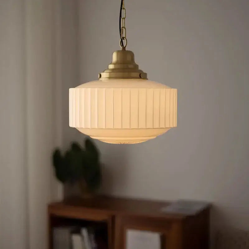 Ribbed cream glass and brass pendant light with vertical ridges for dining room decorbites brass glass pendant