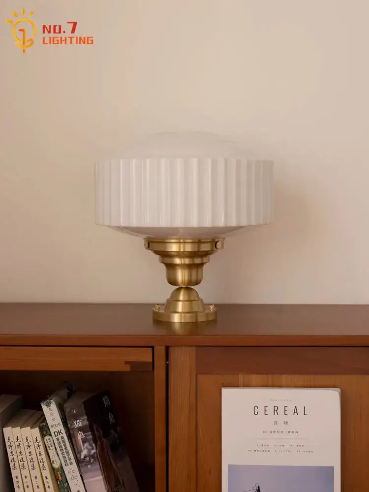 White ribbed glass pendant light with brass base displayed on wooden shelf for dining room decorbites brass glass pendant