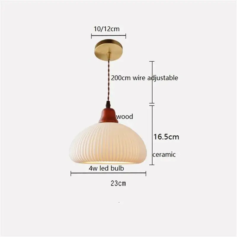 Cream-colored ribbed ceramic led pendant light with wood top and brass mount for dining room decorbites ceramic led