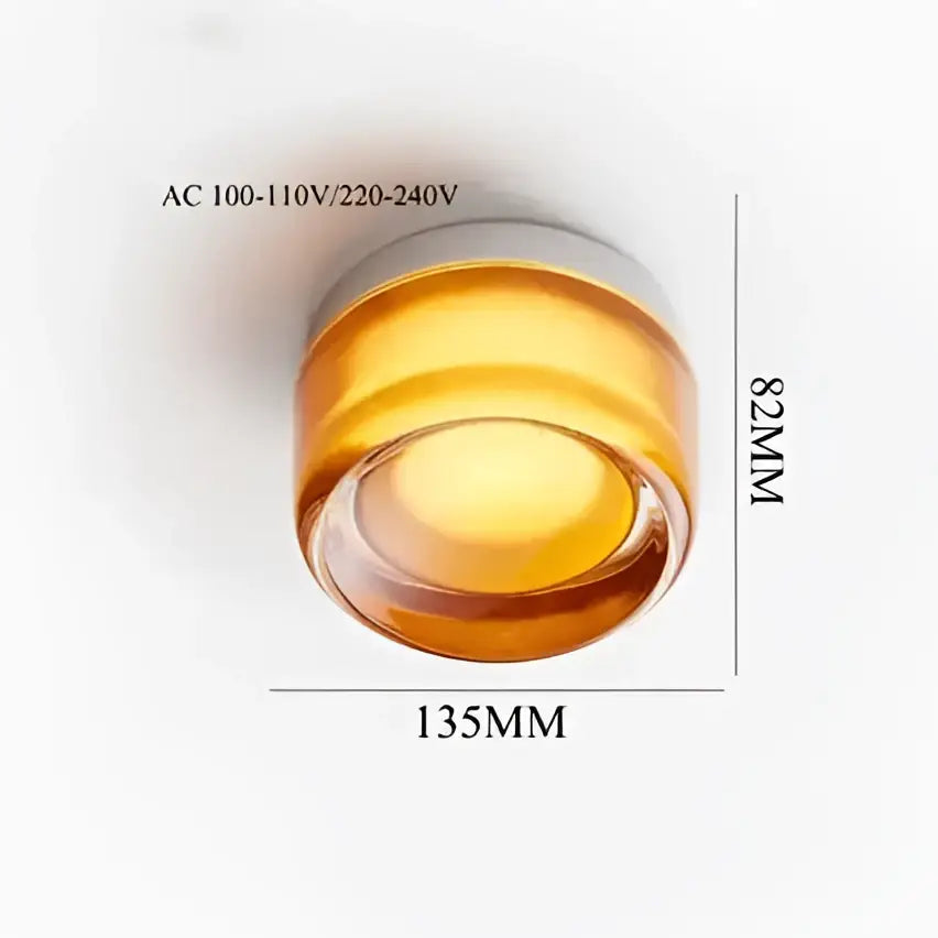 Amber-colored cylindrical recessed ceiling pendant light with frosted glass lens and metallic trim for decorbites ceramic led decor